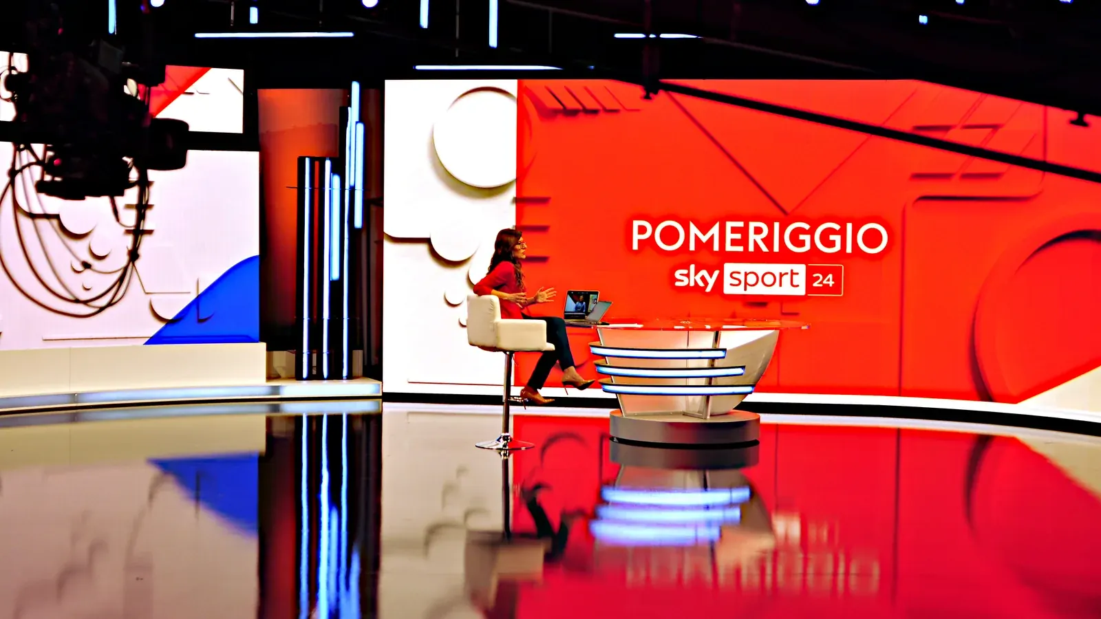 Television broadcast studio set with lighting and camera equipment